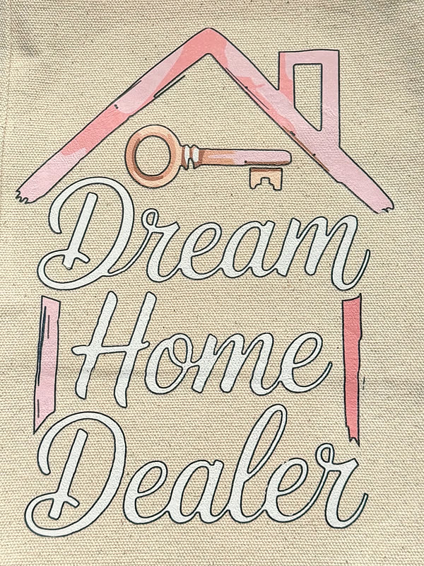 A close view of a two-color slogan print on natural canvas, the outlines and fill sitting flat on the weave.