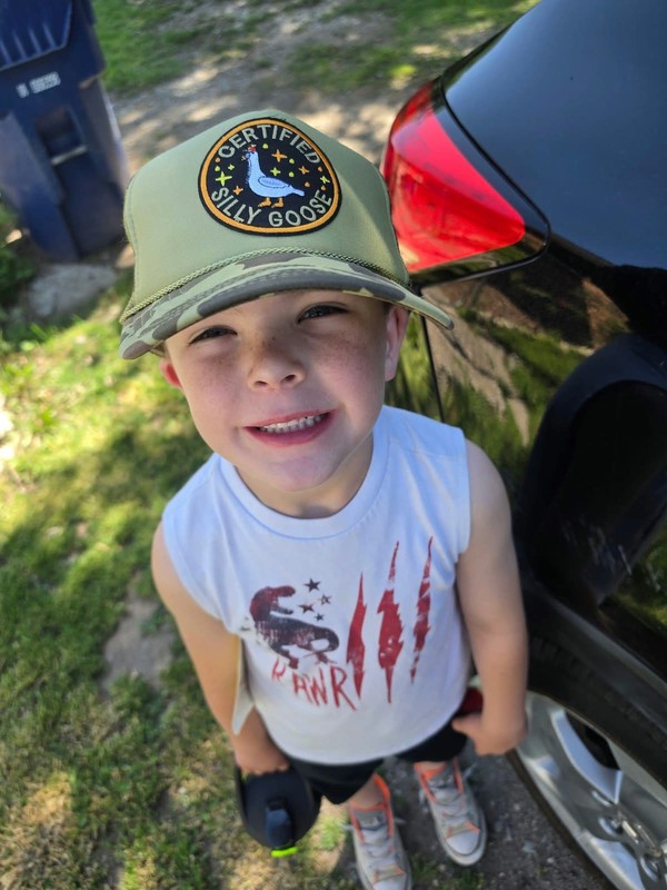 Boy wearing Silly Goose patch cap